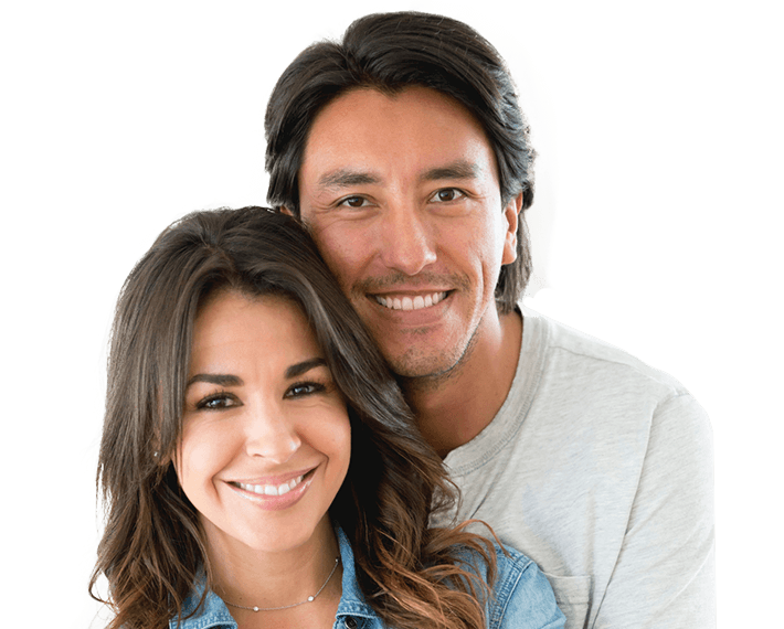 Smiling young man and woman standing together