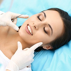 Woman having cosmetic consultation