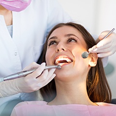 Woman receiving dental exam