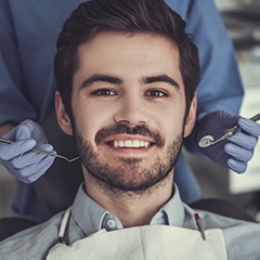 Man receiving dental exam