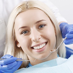 Smiling woman in dental chair