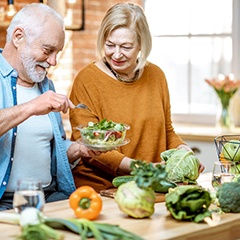An older couple eating a healthy meal together