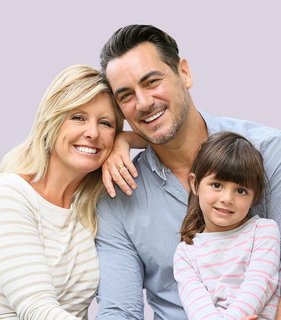 Mother father and young girl smiling