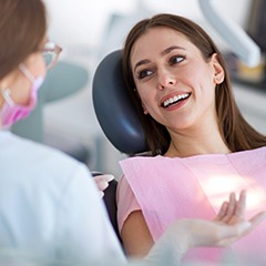 Smiling woman in dental chair