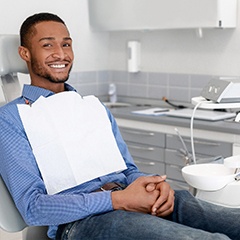 man sitting in the dental chair