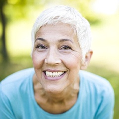 woman grinning from ear to ear