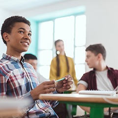 a student sitting at their desk in school