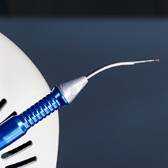 Laser periodontal treatment uses a soft-tissue laser to remove infected gum tissue and kill oral bacteria