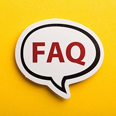 Word bubble containing FAQ on yellow background
