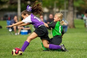 girls in a soccer match