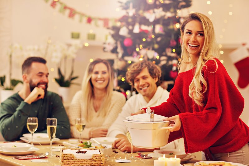 people smiling at holiday function